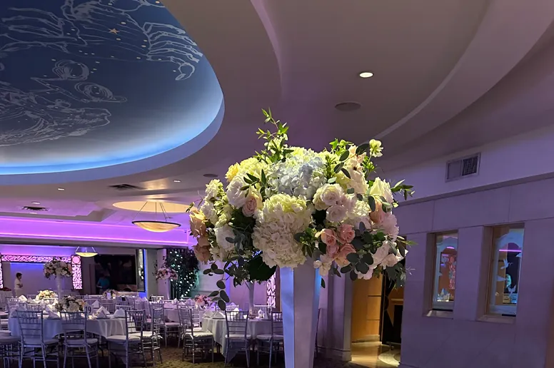 Shot of Full Ballroom Ceiling and Beutiful Flower Arrangement